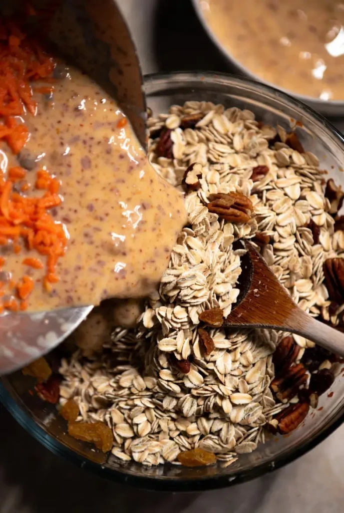 oats and grated carrots mixed into thick batter
