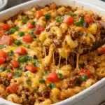 Cheesy Taco Mac Casserole baked with seasoned beef, macaroni, and melted cheese