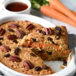 baked oatmeal sliced with golden top and soft interior